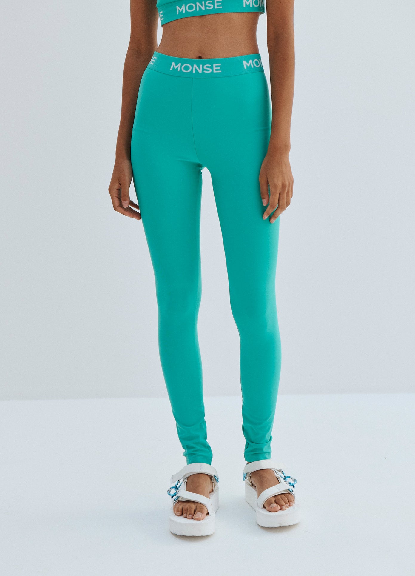 MONSE Logo Leggings in Jade on Model Front View