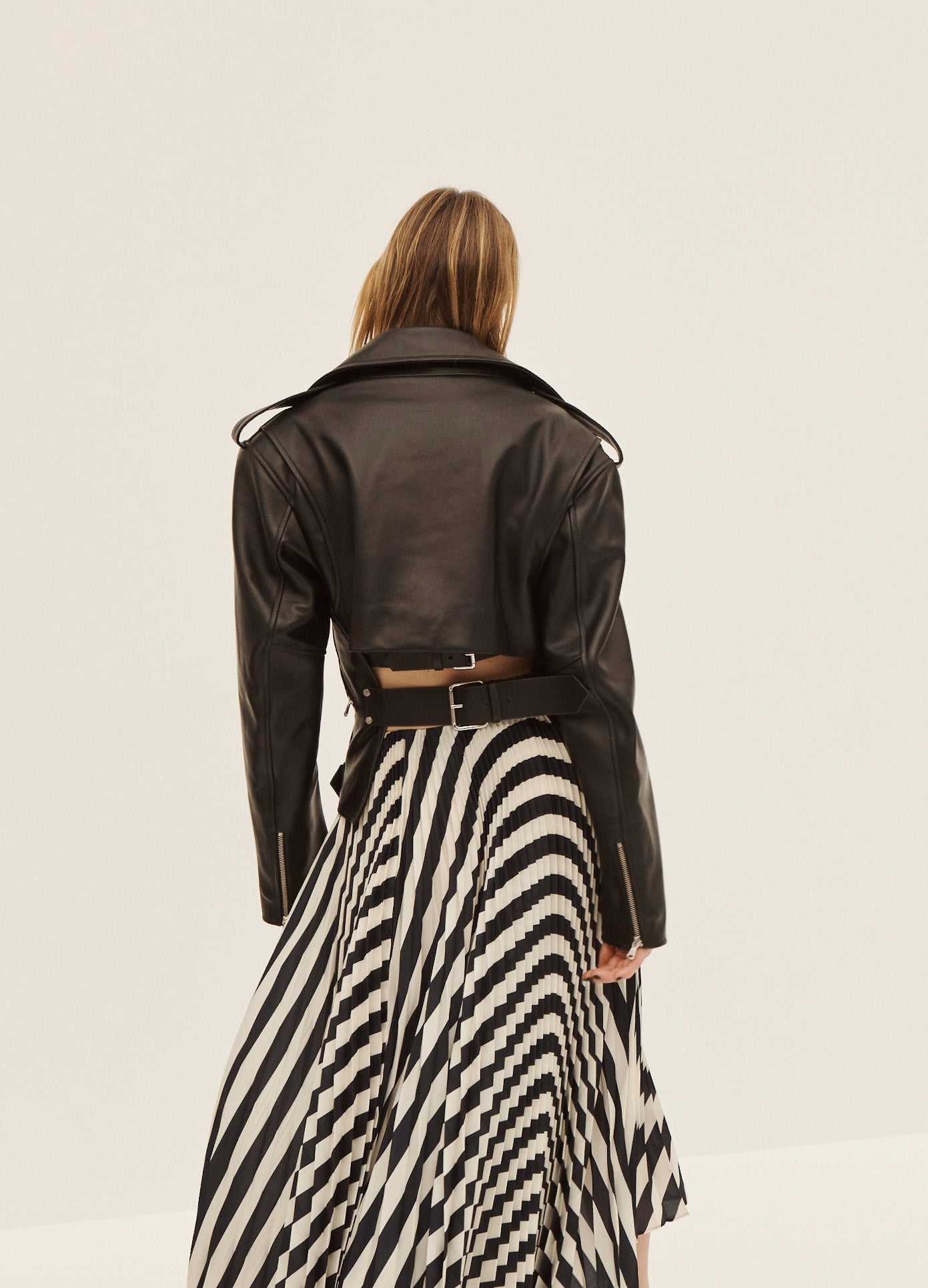 MONSE Long Pleated Skirt in Navy and Ivory on Model Back View