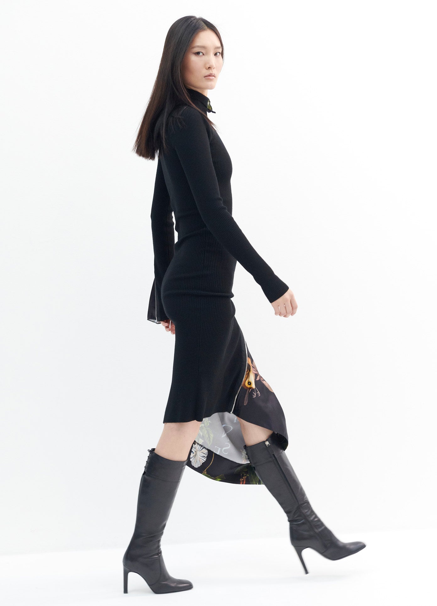 MONSE Long Sleeve Print Inset Zipper Detail Turtleneck Dress in Black Print on Model Walking Right Side View