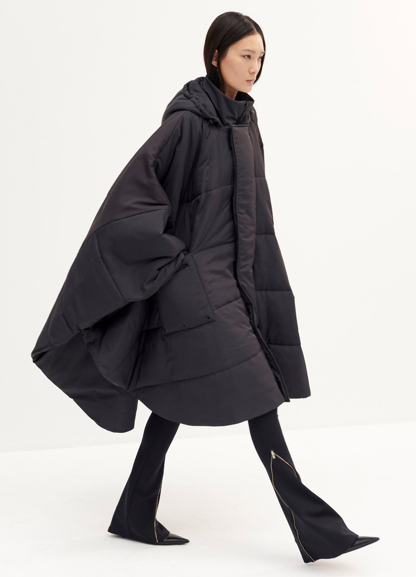 MONSE M Print Quilted Coat in Black M Print on Model Walking Side View