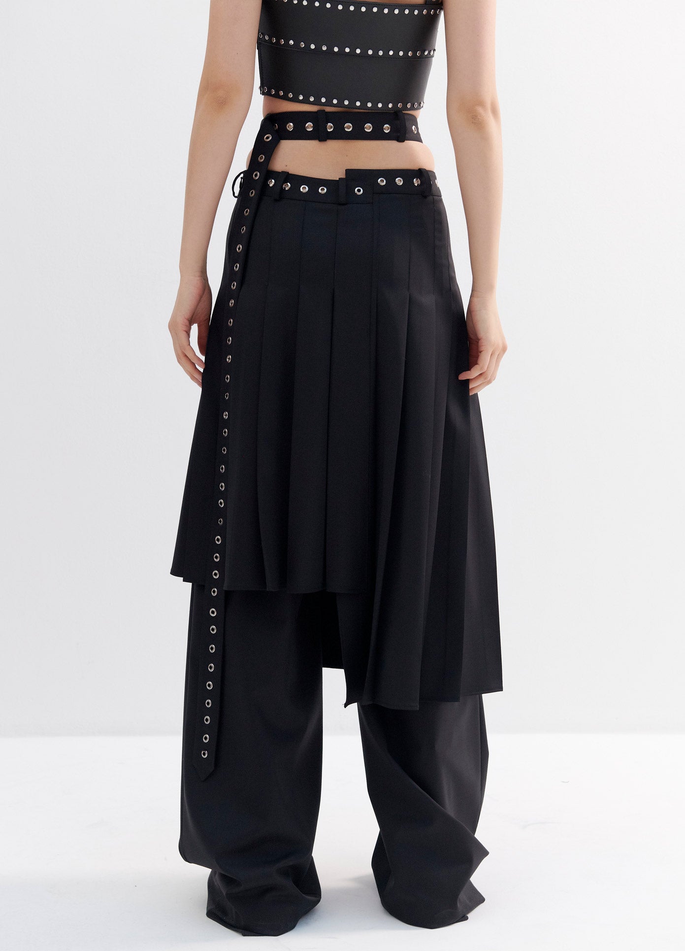 MONSE Pleated Criss Cross Waist Trouser Skirt in Black on Model Back View