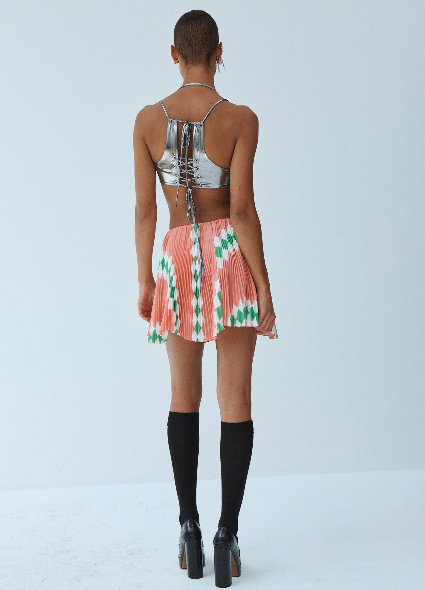 MONSE Pleated Spiral Mini Skirt in Pink Multi on Model Back View
