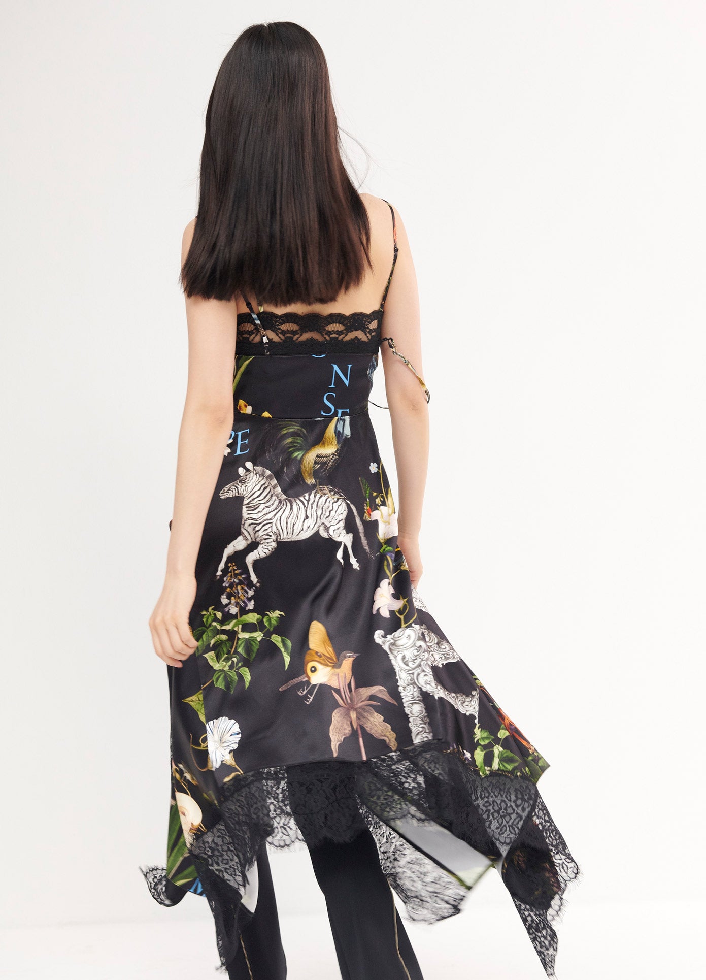 MONSE Print Lace Slip Dress in Black Multi on Model Walking Back View