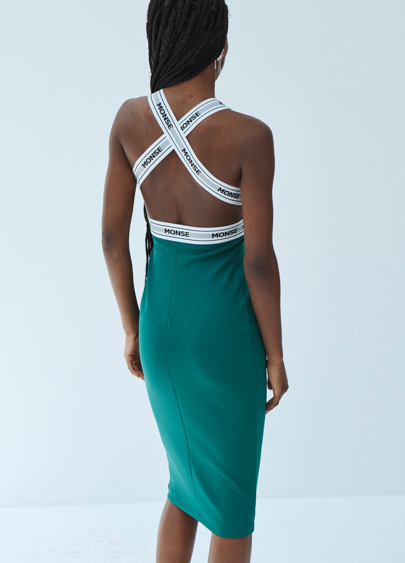 MONSE Scuba Sleeveless Logo Dress in Green on Model Back View