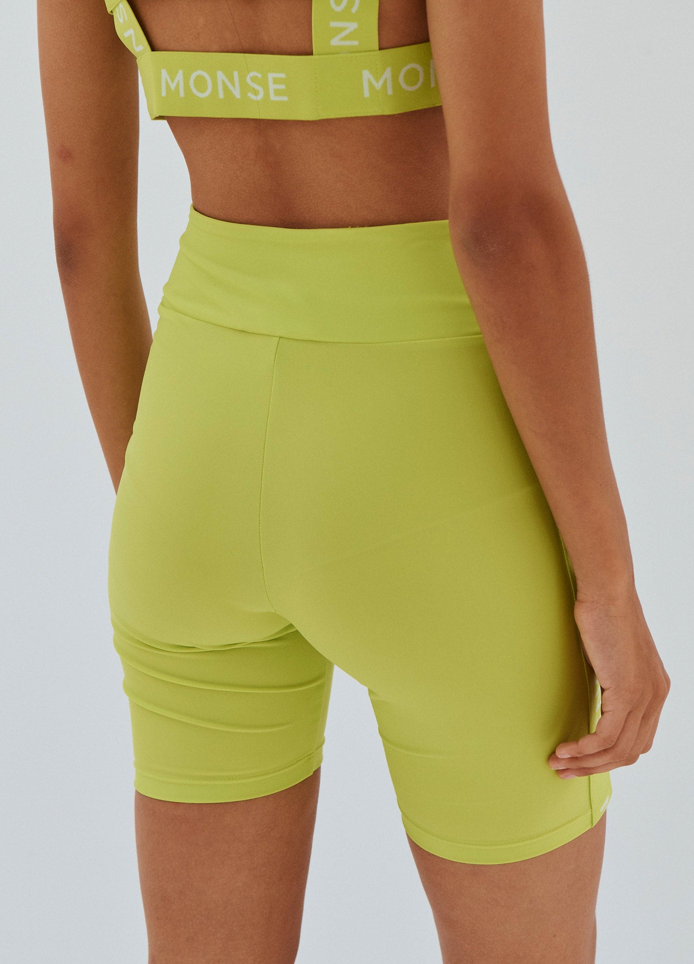 MONSE Side Logo Bike Shorts in Lime on Model Back Detailed View