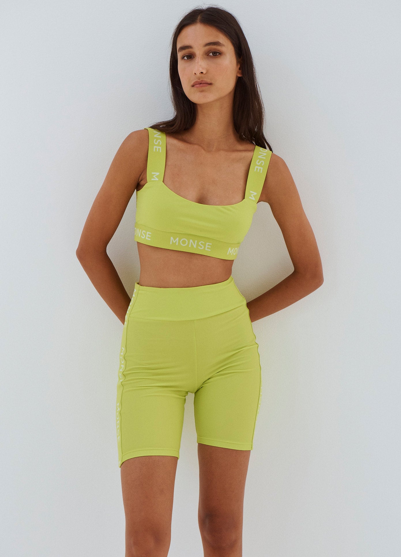 MONSE Side Logo Bike Shorts in Lime on Model Front View
