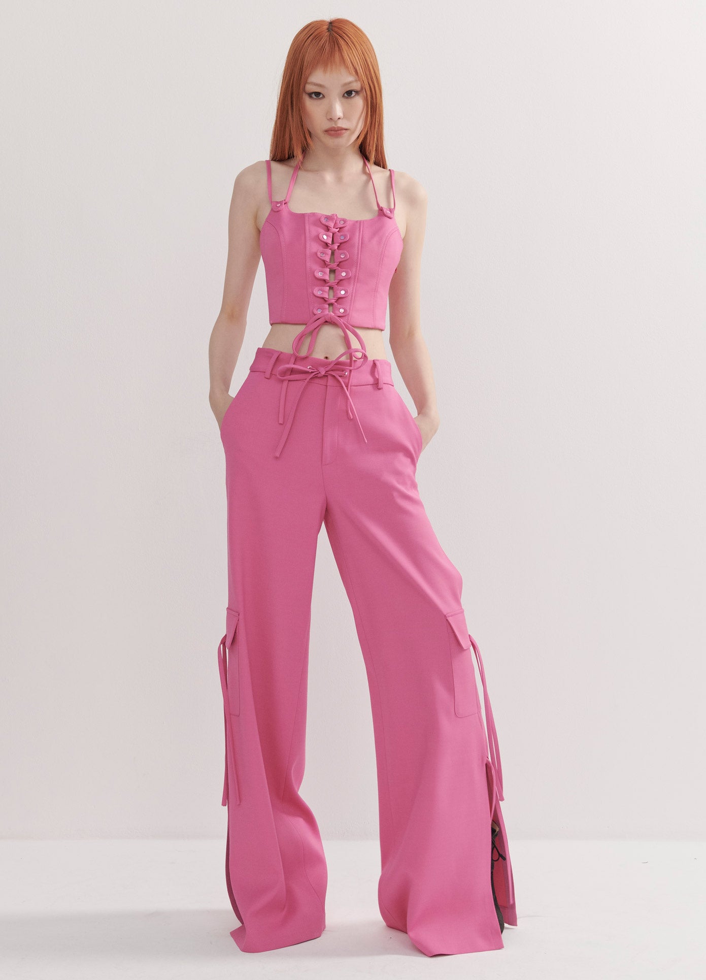 MONSE Side Slit Cargo Pants with Chain in Pink on Model Full Front View