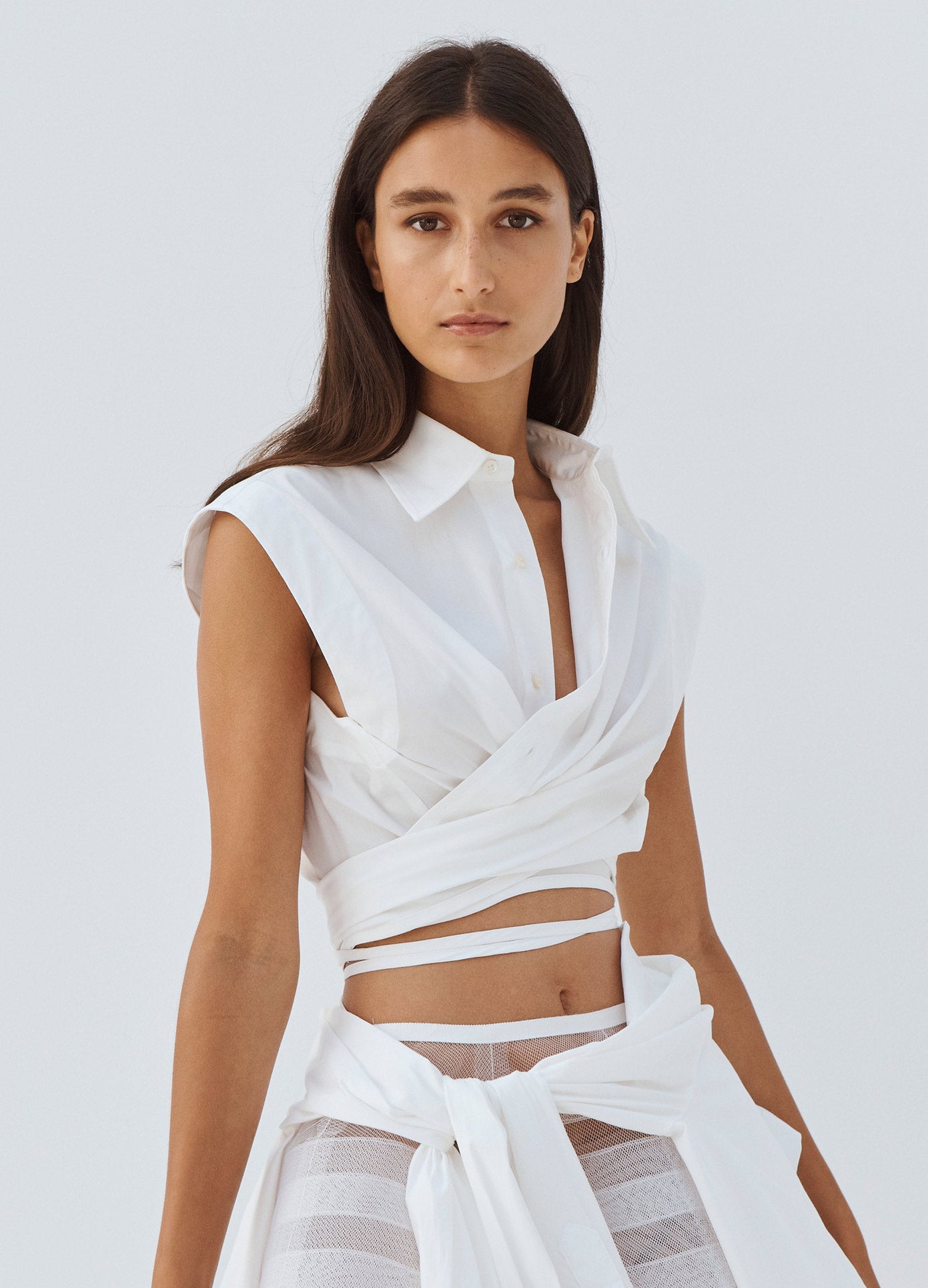 MONSE Sleeveless Draped Shirt in Ivory on Model Front Side Detail View