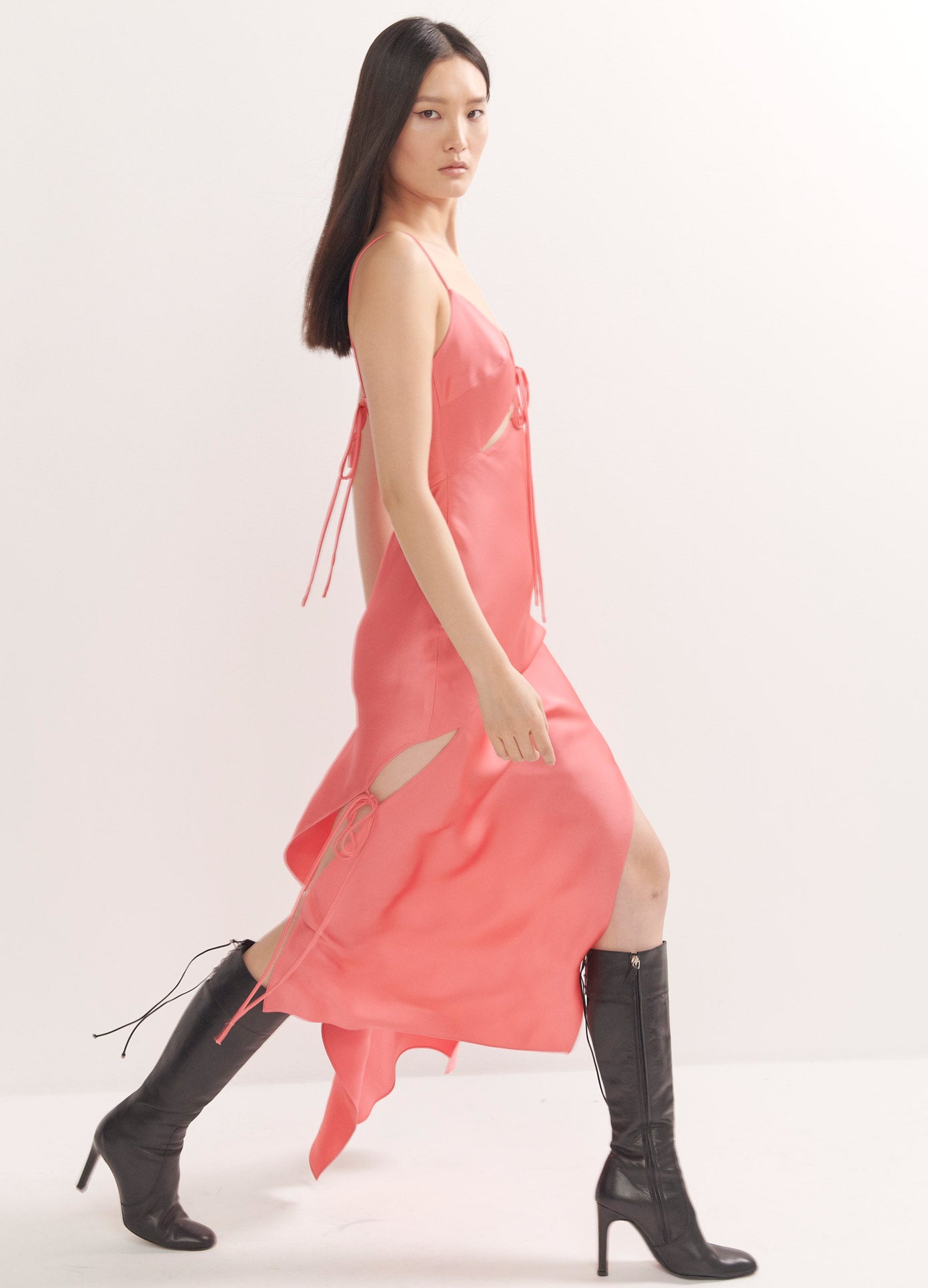 MONSE Slip Dress in Watermelon on Model Walking Right Side View
