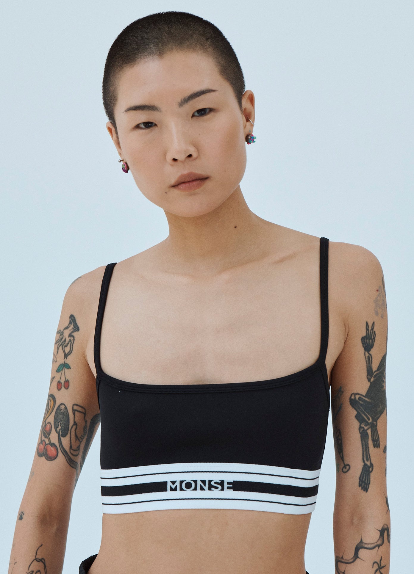 MONSE Sports Bra in Black on Model Front Detail View
