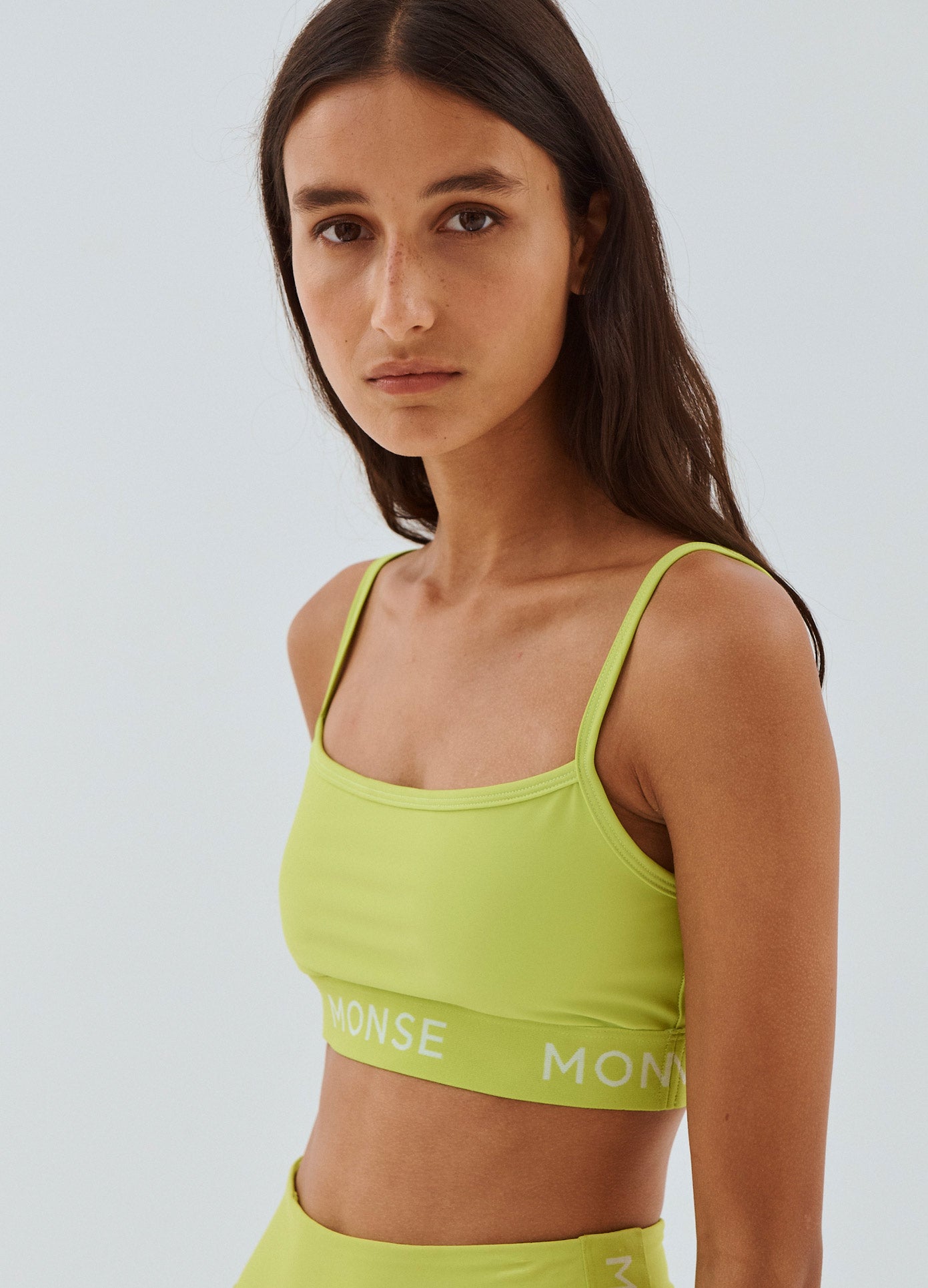 MONSE Sports Bra Top in Lime on Model Front View