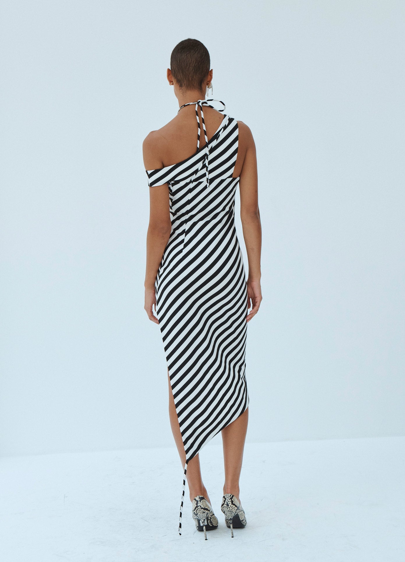 MONSE Striped Asymmetrical Off the Shoulder Keyhole Dress in Black and White on Model Back View