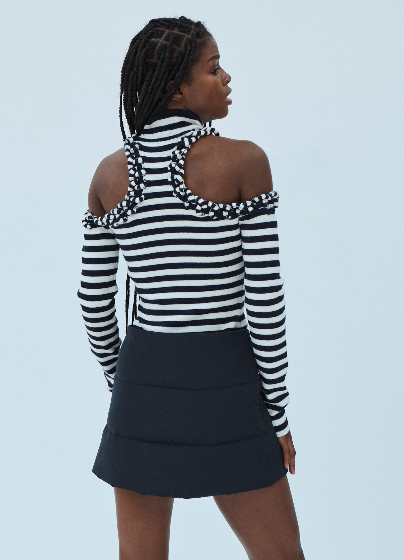 MONSE Striped Cold Shoulder Turtleneck Sweater in Midnight and Ivory on Model Back View