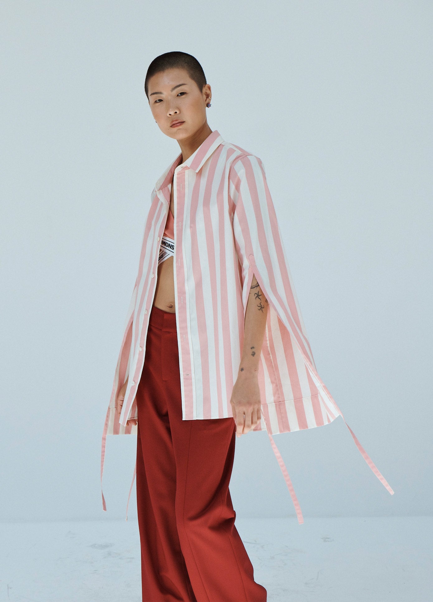 MONSE Striped Long Sleeve Shirt in Pink and Ivory on Model Front Side View