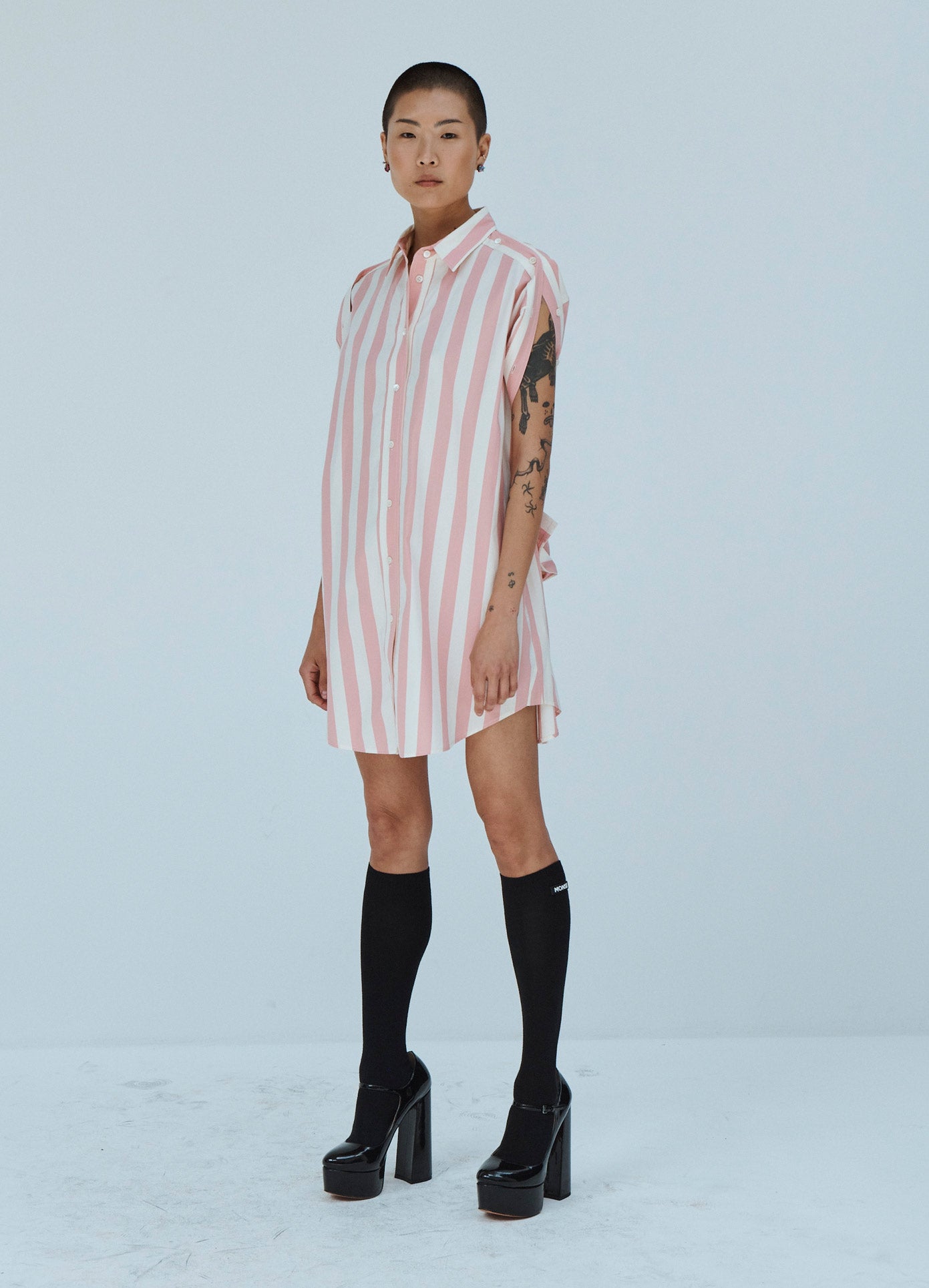 MONSE Striped Tie Back Sleeve Shirt Dress in Pink and Ivory Sleeves Tied on Model Front View