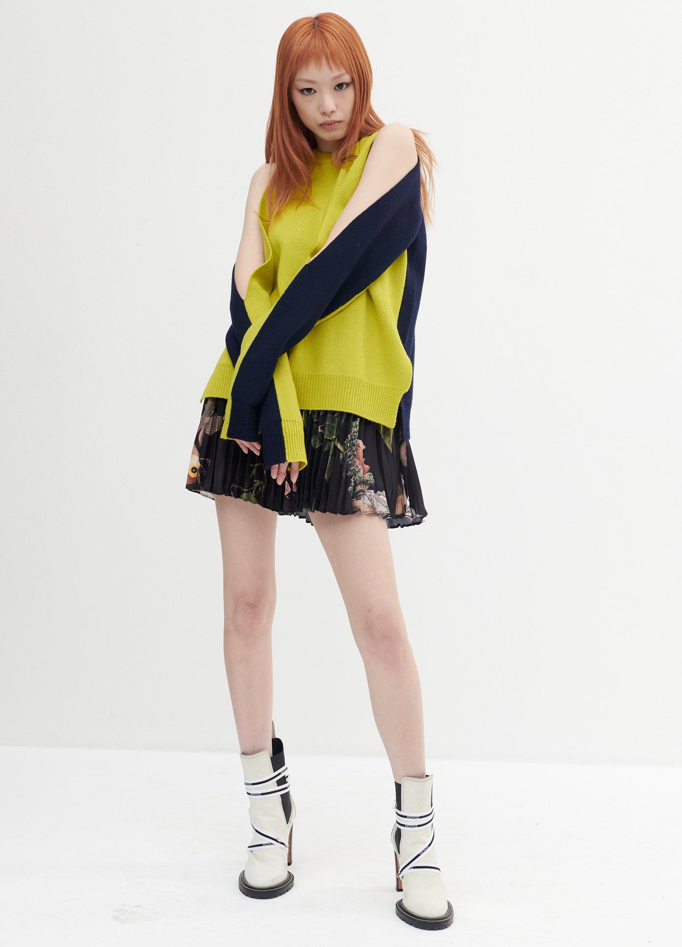 MONSE Two Tone Sleeve Slit Sweater in Lime and Navy on Model Crossing Arms Full Front View