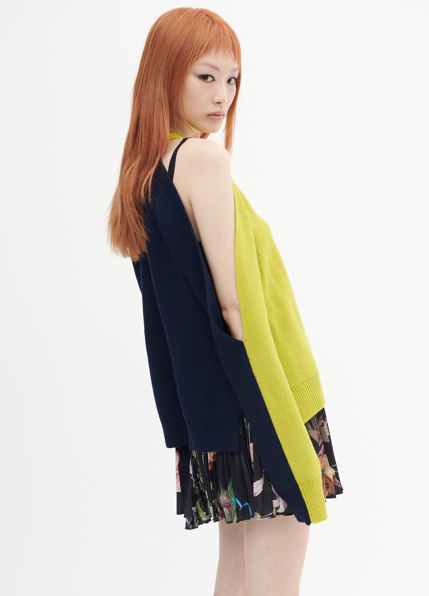 MONSE Two Tone Sleeve Slit Sweater in Lime and Navy on Model Looking Over Shoulder Back View