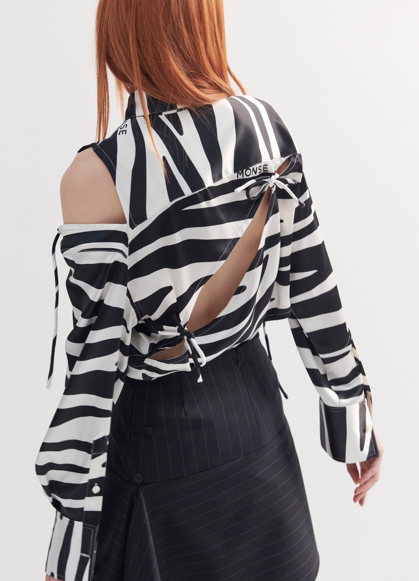 MONSE Zebra Slashed Blouse in Black and White Print on Model Back Detail View