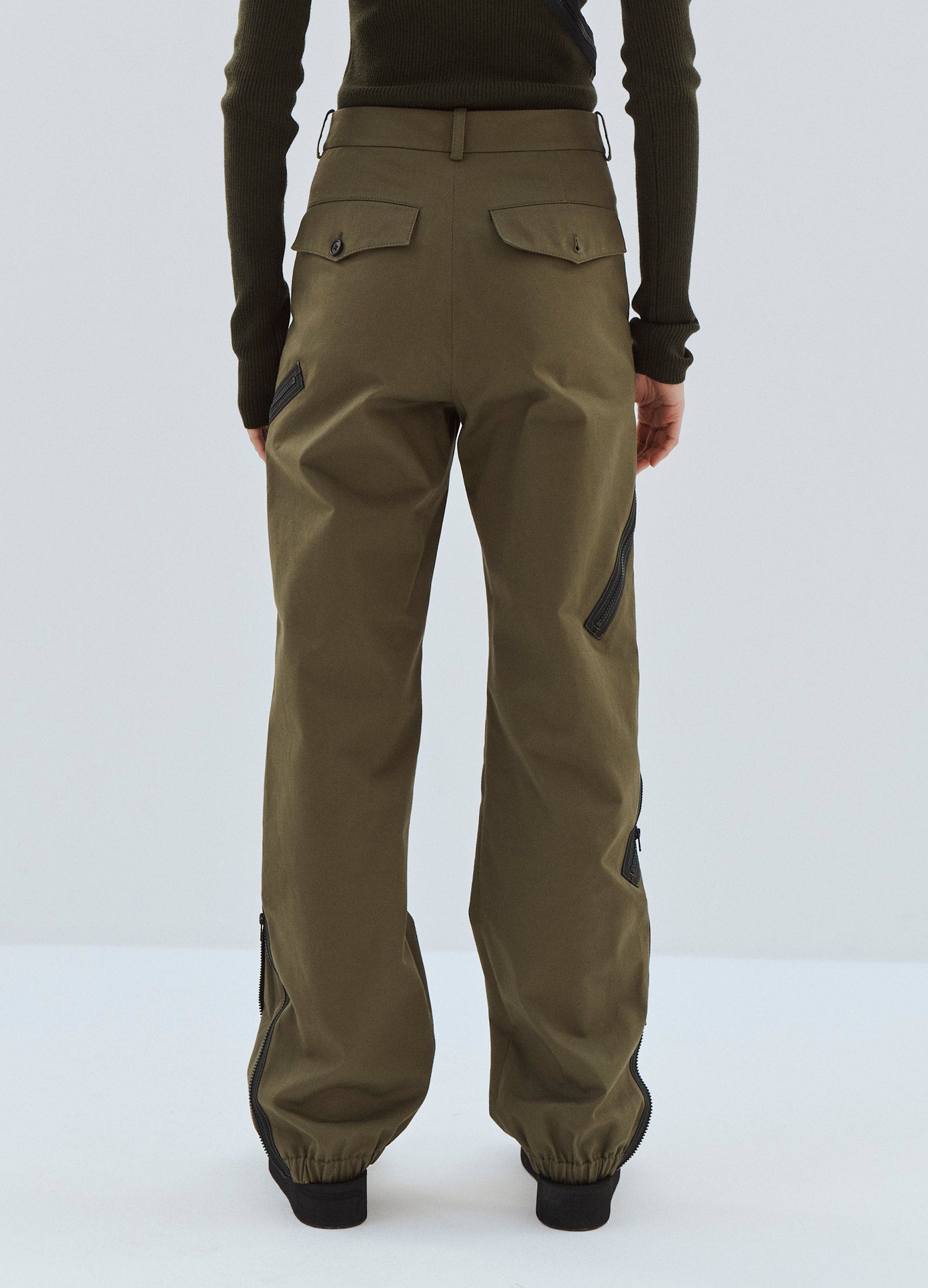 MONSE Zipper Detail Cargo Pants in Olive on Model Back View